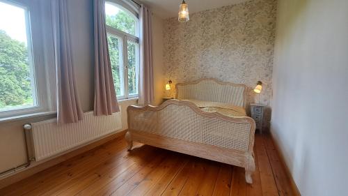 Posteľ alebo postele v izbe v ubytovaní Haus im Park