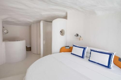 Letto o letti in una camera di Hotel Isabella's Llafranc