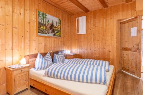 Postel nebo postele na pokoji v ubytování Salmsein Biohof