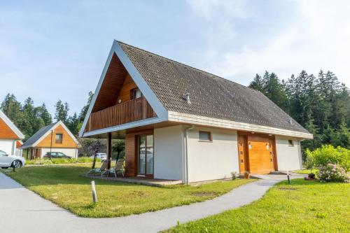 a small house with a gambrel roof at Apartment Rosemary in Topolšica