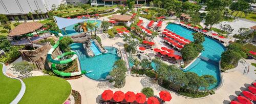 an aerial view of a pool at a resort at Amari Pattaya in Pattaya Central