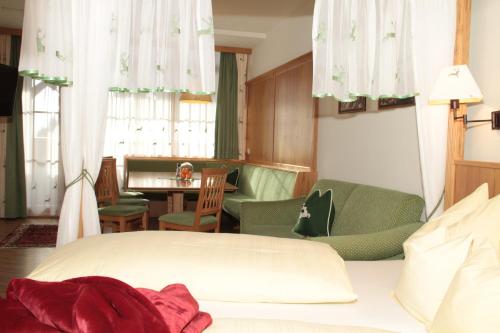 Zona de estar de Alpen Appartements Zauchensee