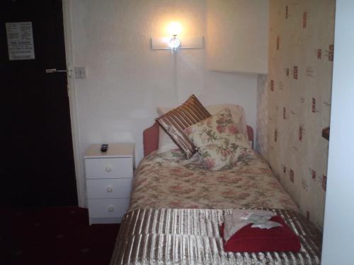 Postel nebo postele na pokoji v ubytování Oban House