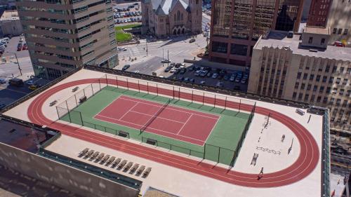 a tennis court on top of a building in a city at Grand Hyatt Denver in Denver