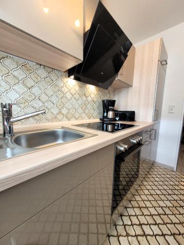 Kuchyň nebo kuchyňský kout v ubytování Winterberg Appartement 21110