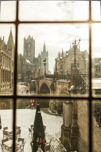 a view of a city from a window at Hostel Uppelink in Ghent