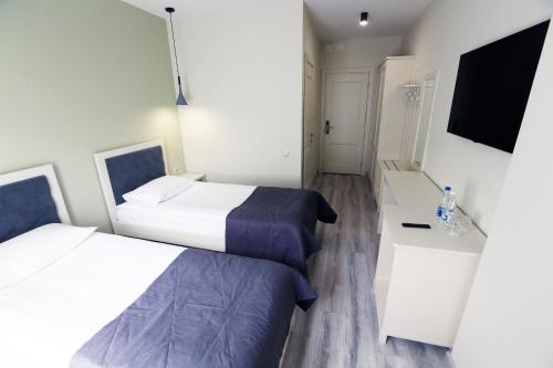 Cama o camas de una habitación en Hotel Golden lemon Готель Золотий лимон