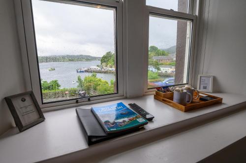a window with a view of a body of water at Coolin View in Portree