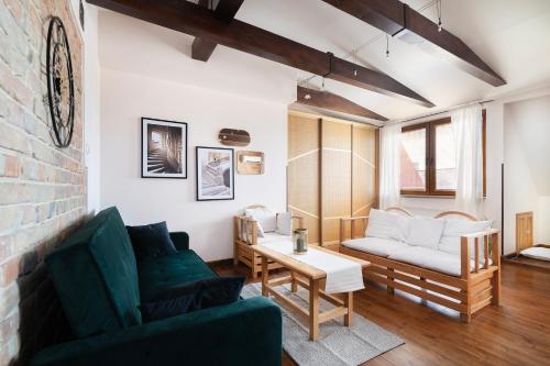 a living room with a couch and a table at EASY RENT Apartments - Okopowa, Centrum 24h Check-in in Lublin