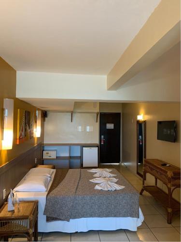 Katil atau katil-katil dalam bilik di Lumar Hotel PontaNegra