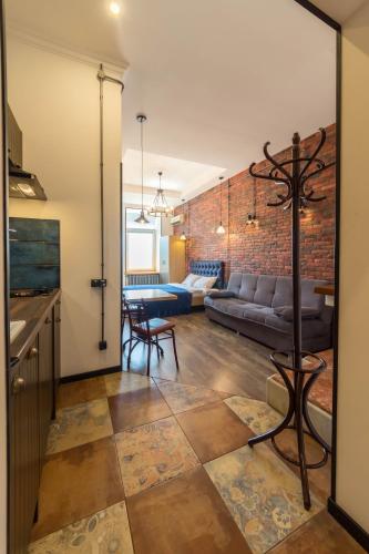 Телевизор и/или развлекательный центр в Central Apartments Maidan Area