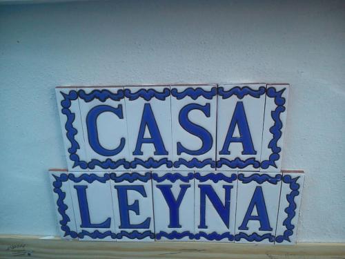 a sign that says casa lynm on a wall at Casa Leyna in El Golfo