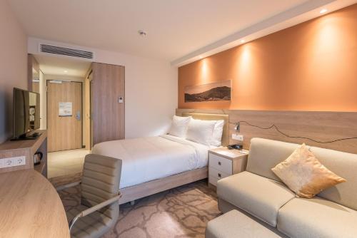 Letto o letti in una camera di Hampton By Hilton Freiburg