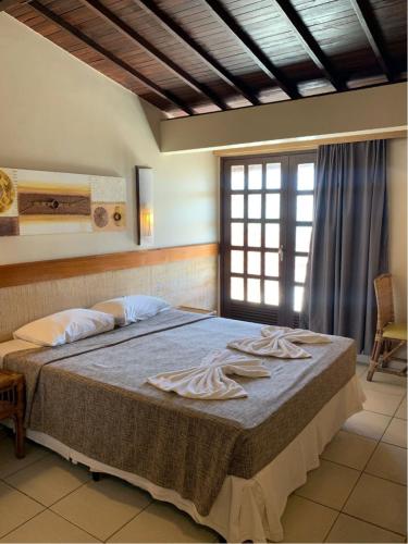 Katil atau katil-katil dalam bilik di Lumar Hotel PontaNegra