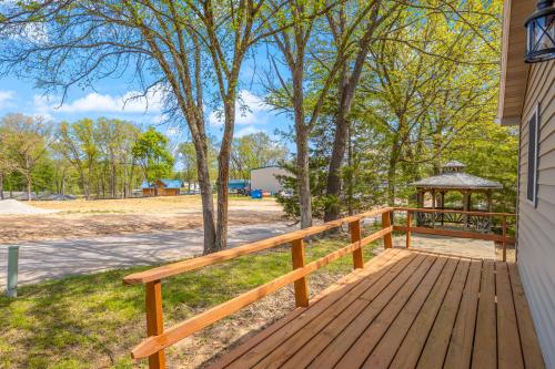 a wooden deck with a gazebo on a house at Eternal Sunrises in Sunrise Beach