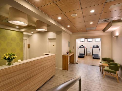 a hospital lobby with a waiting area and a waiting room at Prima Kings Hotel in Jerusalem