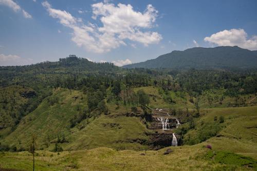 a view of a valley with mountains in the background at Waterfall Villa by Opulence in Talawakele