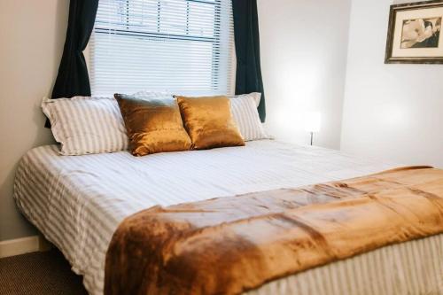 a large bed in a bedroom with a window at Cozy 3-Bed Athens Getaway, Right Near UGA! in Athens