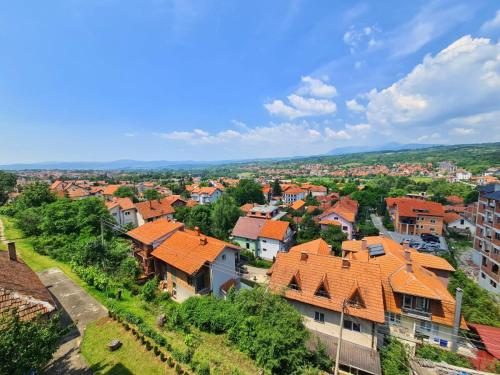 an aerial view of a town with orange roofs at Apartman Berlin Sokobanja in Soko Banja