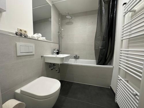 Ένα μπάνιο στο Apartment Wesseling