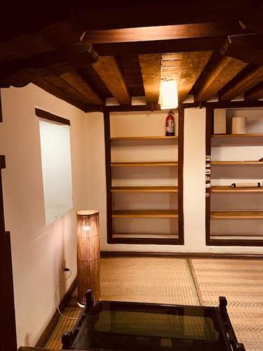 a room with a tub in the middle of a room at Traditional Nepali Style 2 BHK Apartments, Humble Home, Patan in Pātan
