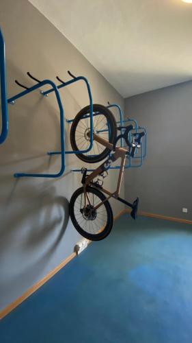 a bike on a bike rack in a room at Locarno Youth Hostel in Locarno