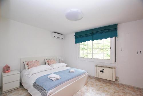 Ένα ή περισσότερα κρεβάτια σε δωμάτιο στο Sunny house