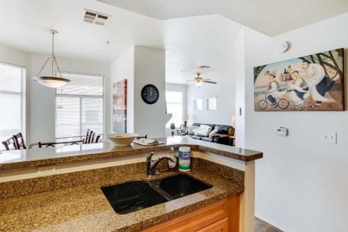 a kitchen with a sink and a counter top at Tranquil Scottsdale Condo with Community Pool! in Scottsdale
