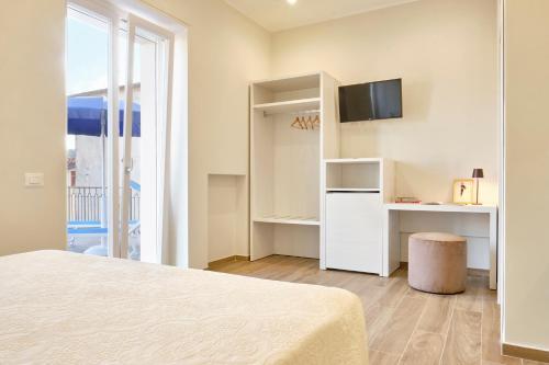 Ένα ή περισσότερα κρεβάτια σε δωμάτιο στο Casa Chiari