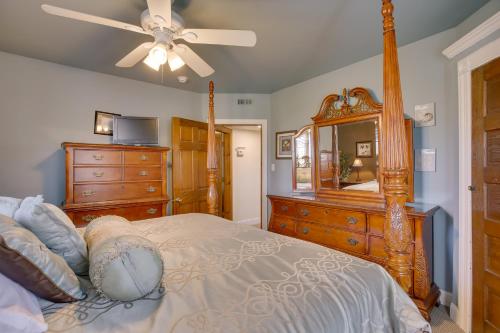 een slaapkamer met een bed, een dressoir en een spiegel bij Spacious Jersey Shore Getaway Walk to Beach! in Wildwood