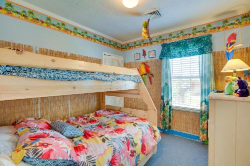 a bedroom with a bunk bed in a room at Cozy Jersey Shore Cottage with Beach Chairs! in Wildwood