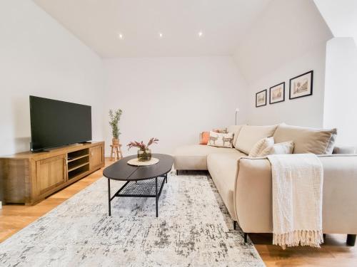TV a/nebo společenská místnost v ubytování Apartament Pod Siódemka