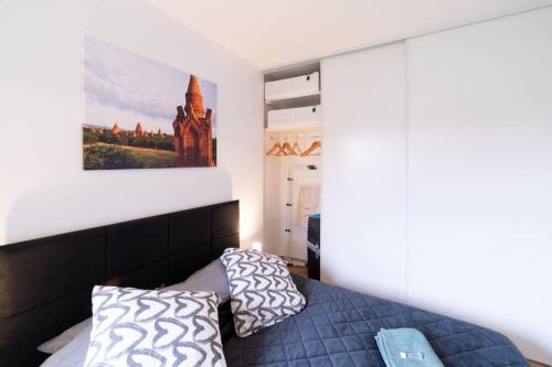 Llit o llits en una habitació de Le Cocon St Cyprien - Centre - Parking - Tramway