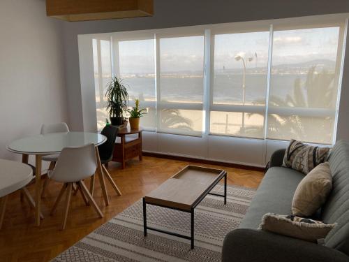 Зона вітальні в Apartamento en Sada en primera línea de playa