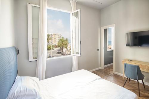 Кровать или кровати в номере Albium - Hotel Sul Mare