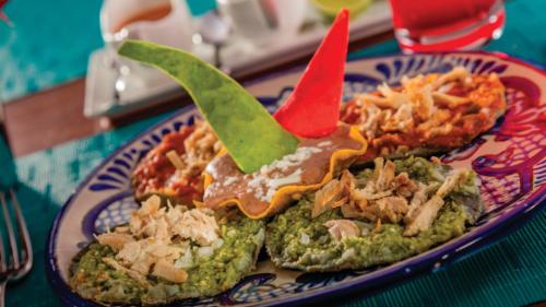 a plate of food on a table with food on it at Presidente InterContinental Puebla by IHG in Puebla