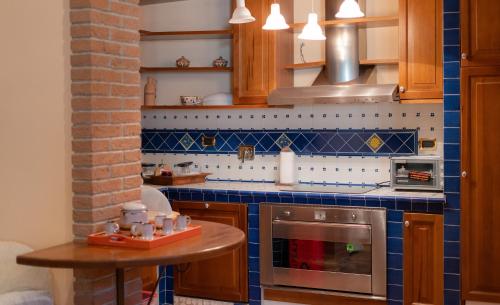 Kjøkken eller kjøkkenkrok på Ortensia - Villa Rita