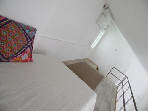 เตียงในห้องที่ Apartment Angie