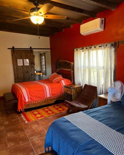 Postel nebo postele na pokoji v ubytování Casa Concepcion Suites