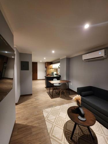 Posezení v ubytování Modernos departamentos tipo LOFT a dos calles del estadio