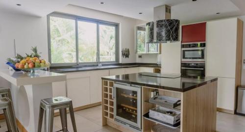 Køkken eller tekøkken på Villa Nénuphar Mauritius with Butler and private Cook