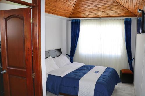 Ένα ή περισσότερα κρεβάτια σε δωμάτιο στο Hotel Costa Azul