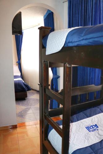 Ένα ή περισσότερα κρεβάτια σε δωμάτιο στο Hotel Costa Azul