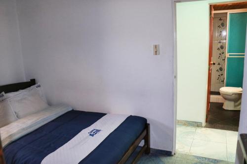 Ένα ή περισσότερα κρεβάτια σε δωμάτιο στο Hotel Costa Azul