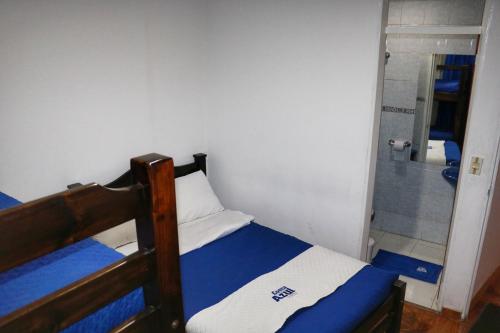 Ένα ή περισσότερα κρεβάτια σε δωμάτιο στο Hotel Costa Azul