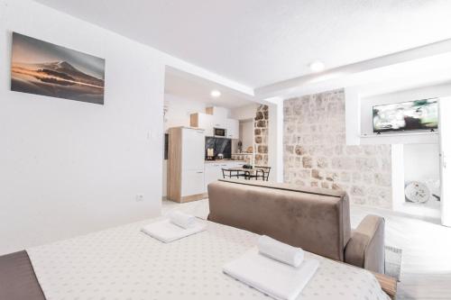 Kuchyň nebo kuchyňský kout v ubytování Apartments Florian