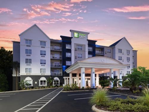 an image of a hotel with a parking lot at Holiday Inn Express & Suites Lakeland North I-4 by IHG in Lakeland