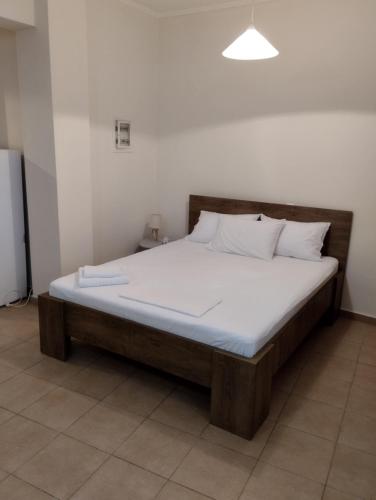 Posteľ alebo postele v izbe v ubytovaní Διατίθεται Γκαρσονιέρα