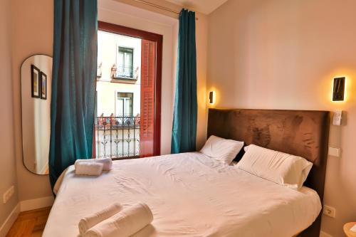 Ένα ή περισσότερα κρεβάτια σε δωμάτιο στο #Madrid Centro. 3D. Gran Via. Callao.Puerta del Sol