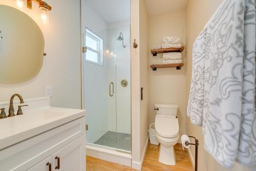 a bathroom with a toilet and a shower at Cozy Ocala Retreat with Pool, Screened Lanai! in Ocala